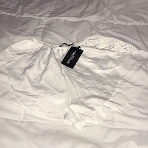 Pretty Little Thing: White Satin Shorts